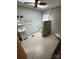 Neutral bathroom design with walk-in shower, sink and fixtures at 10516 Hambright Rd, Huntersville, NC 28078