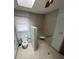 Accessible bathroom featuring a walk-in shower and toilet at 10516 Hambright Rd, Huntersville, NC 28078