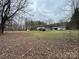 Vast backyard with trees creating privacy around the property at 10516 Hambright Rd, Huntersville, NC 28078