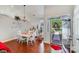 Bright entryway with hardwood floors, chandelier and view of the front yard at 11003 Pale Hickory Ln, Charlotte, NC 28215