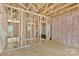 Unfinished bathroom featuring wall insulation, and construction framing at 1235 E Poplar St, Conover, NC 28613