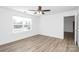 Bright bedroom with hardwood floors and natural light from a window at 1235 E Poplar St, Conover, NC 28613