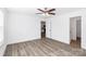 Bedroom featuring hardwood floors and neutral paint at 1235 E Poplar St, Conover, NC 28613