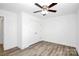 Bedroom featuring hardwood floors, closet and neutral paint at 1235 E Poplar St, Conover, NC 28613
