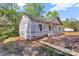 Exterior view of the home under construction with visible foundation and porch at 1235 E Poplar St, Conover, NC 28613