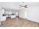 Open concept kitchen featuring white cabinets, stainless steel appliances and a kitchen island at 1235 E Poplar St, Conover, NC 28613
