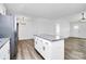 Open floor plan view of the kitchen island and dining area at 1235 E Poplar St, Conover, NC 28613