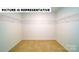 Spacious walk-in closet featuring carpeted floors and metal shelving for optimal storage and organization at 134 Woodhall Way, Troutman, NC 28166