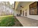 Covered patio with a ceiling fan and seating offering a relaxing outdoor space at 13625 Buster Rd, Stanfield, NC 28163