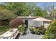 The backyard has beautiful landscaping and a patio area at 1519 The Plz, Charlotte, NC 28205