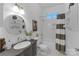 Bright bathroom featuring modern fixtures, subway tile, and a stylish vanity at 1519 The Plz, Charlotte, NC 28205