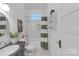 Bright bathroom featuring modern fixtures, subway tile, and a stylish vanity at 1519 The Plz, Charlotte, NC 28205