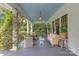 Relaxing front porch with stylish seating, lush greenery, and a welcoming atmosphere at 1519 The Plz, Charlotte, NC 28205