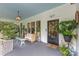 Inviting front porch with comfortable seating, charming decor, and a cozy ambiance at 1519 The Plz, Charlotte, NC 28205