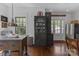 Charming kitchen features hardwood floors, stainless steel appliances, and custom cabinetry at 1519 The Plz, Charlotte, NC 28205