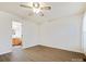 Bedroom featuring hardwood flooring, light colored walls, and adjoining bathroom at 1520 Venture Oaks Ln, Monroe, NC 28110