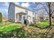 Well-kept backyard with lush lawn, patio, and a black iron fence at 1857 Felts Pkwy, Fort Mill, SC 29715