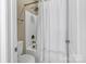 Bathroom featuring a toilet, shower and tub combination with a shower curtain at 1857 Felts Pkwy, Fort Mill, SC 29715