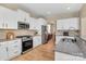 Modern kitchen featuring stainless steel appliances, granite counters and a gas range at 1857 Felts Pkwy, Fort Mill, SC 29715