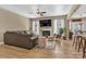 Cozy living room with fireplace, ceiling fan, and comfortable seating area at 1857 Felts Pkwy, Fort Mill, SC 29715