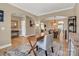 Inviting living room featuring a desk, decorative chair and light neutral walls at 1857 Felts Pkwy, Fort Mill, SC 29715