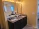 Bright bathroom has granite countertops, double sinks and decorative mirrors at 190 Glastonbury Dr, Mooresville, NC 28115