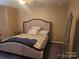 Comfortable bedroom features neutral walls, carpet and large bed at 190 Glastonbury Dr, Mooresville, NC 28115