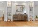 Interior display of custom cabinets and hardwood flooring, creating an inviting space for entertaining at 2011 Trailwood Dr, Matthews, NC 28104