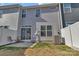Cozy backyard patio with privacy fence and sliding glass door access to home at 2149 Bexar Trl, Matthews, NC 28105