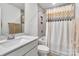 Modern bathroom featuring a tub, tiled shower, and a white vanity at 2149 Bexar Trl, Matthews, NC 28105