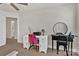 Bedroom area showcasing a desk, and vanity space at 2149 Bexar Trl, Matthews, NC 28105