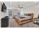 Spacious main bedroom featuring a tray ceiling, carpet, and an abundance of light at 2149 Bexar Trl, Matthews, NC 28105