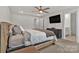 Main bedroom suite featuring a modern ceiling fan and a flat screen television at 2149 Bexar Trl, Matthews, NC 28105