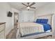 Spacious main bedroom featuring a ceiling fan, natural light, and access to the main bathroom at 2149 Bexar Trl, Matthews, NC 28105