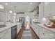 Spacious kitchen with stainless steel appliances, white cabinetry, and hardwood floors throughout at 261 Supernova Dr, York, SC 29745