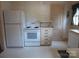 Kitchen with white appliances and lots of storage at 2815 Glendale Rd, Charlotte, NC 28209
