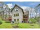 Back exterior view with two-story deck and manicured backyard at 2819 Blythe Rd, Waxhaw, NC 28173