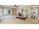 Versatile basement area with durable carpet, mirrored wall, and french doors to enjoy a bright space at 2819 Blythe Rd, Waxhaw, NC 28173