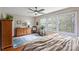 Bedroom with hardwood flooring, ceiling fan and ensuite bath at 2819 Blythe Rd, Waxhaw, NC 28173