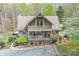 Exterior elevation of the home with a large front porch and well-kept landscaping at 2819 Blythe Rd, Waxhaw, NC 28173