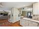 Updated kitchen with granite countertops provides easy access to the living room and dining area at 2819 Blythe Rd, Waxhaw, NC 28173