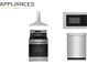 Appliance package featuring a modern range, microwave, and dishwasher at 3003 Casting St # 12, Charlotte, NC 28206