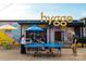 Vibrant outdoor community area with people enjoying a game of ping pong and colorful decor, creating a lively atmosphere at 3003 Casting St # 12, Charlotte, NC 28206