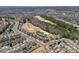 An aerial view shows homes in a neighborhood adjacent to a golf course and heavily wooded areas at 3100 Azalea Dr, Fort Mill, SC 29707