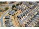 Aerial view showcases a residential neighborhood with mature trees, well-kept lawns, and manicured streets at 3100 Azalea Dr, Fort Mill, SC 29707