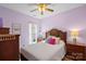 Comfortable bedroom with a cozy bed, wooden furniture, and neutral colored walls at 3100 Azalea Dr, Fort Mill, SC 29707