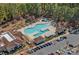 Aerial view of a community pool featuring a lap area, recreational space, and ample parking at 3100 Azalea Dr, Fort Mill, SC 29707