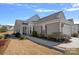 Charming single-story home featuring neutral siding, manicured landscaping, and an attached two-car garage at 3100 Azalea Dr, Fort Mill, SC 29707