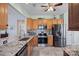 Well-equipped kitchen featuring granite countertops and stainless steel appliances at 3100 Azalea Dr, Fort Mill, SC 29707