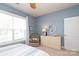 Bedroom with large window, chair, and dresser at 3102 Arches Bluff Cir, Lancaster, SC 29720